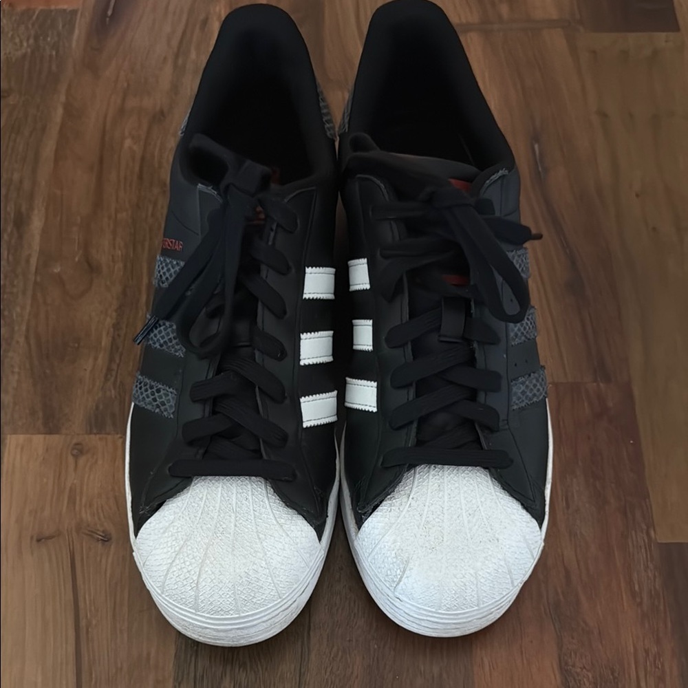 Adidas Superstar Black and White Sneakers - Men’s 11, size 44.